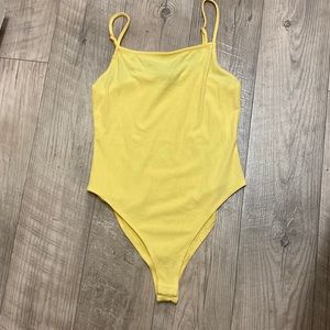 yellow body suit tank